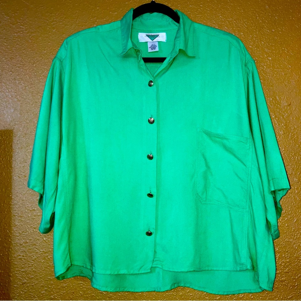 Women’s oversized button down short sleeve shirt.